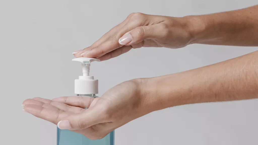 a person using a pump of liquid